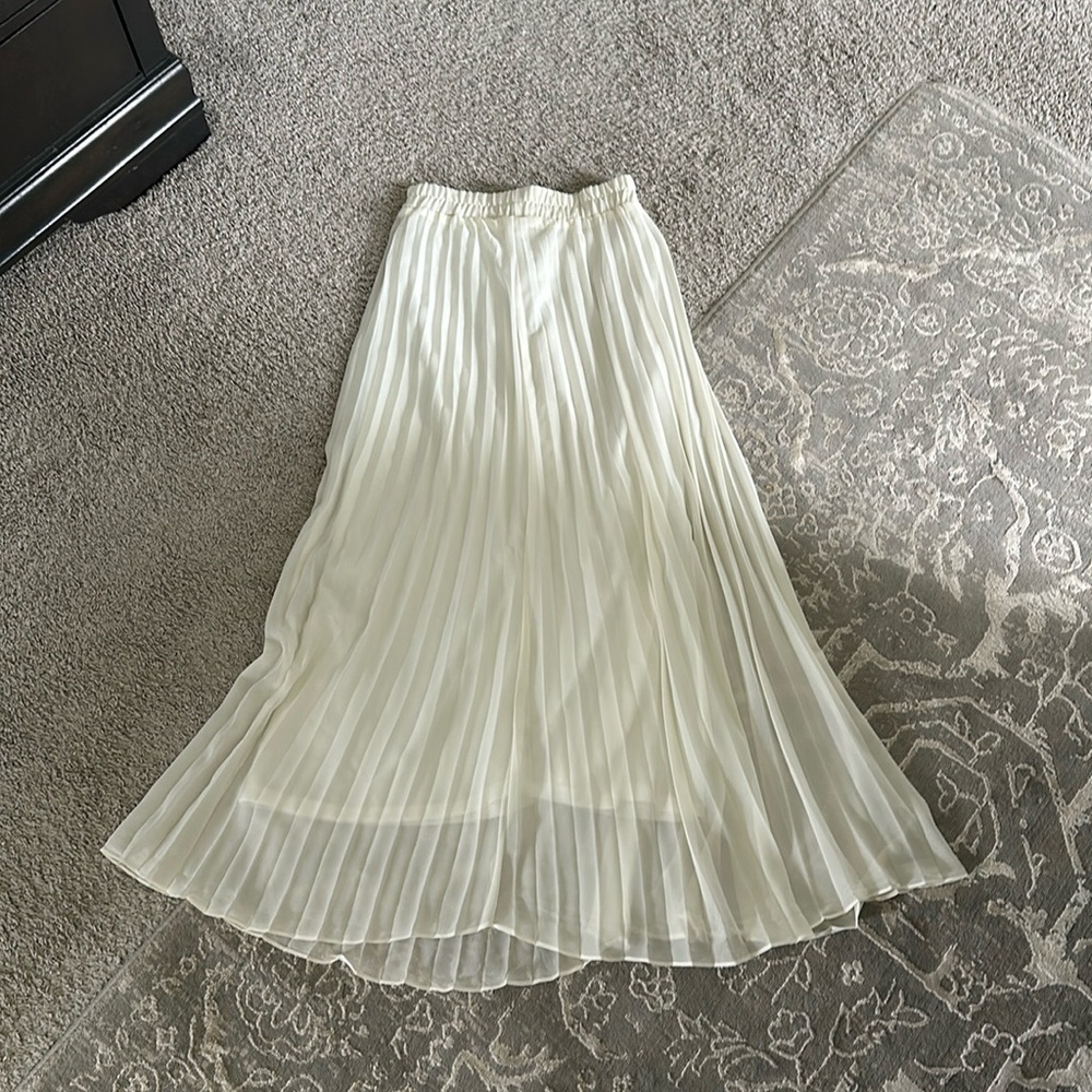 Pleated cream maxi skirt